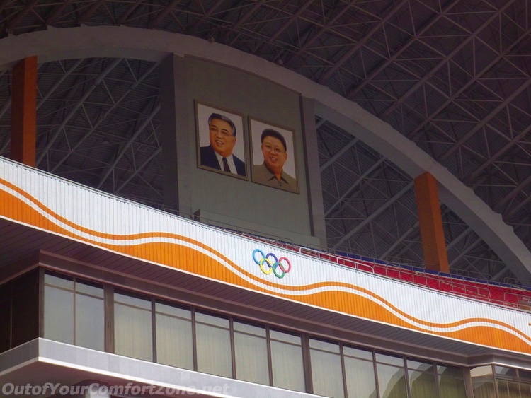 Kim family portraits may day stadium pyongyang North Korea 