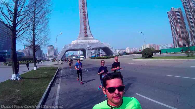Rodrigo running past one of Pyongyang's many monuments during the 10K 