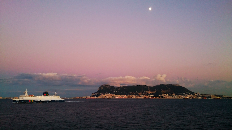 view of Gibraltar from ferry straight of Gibraltar sunset